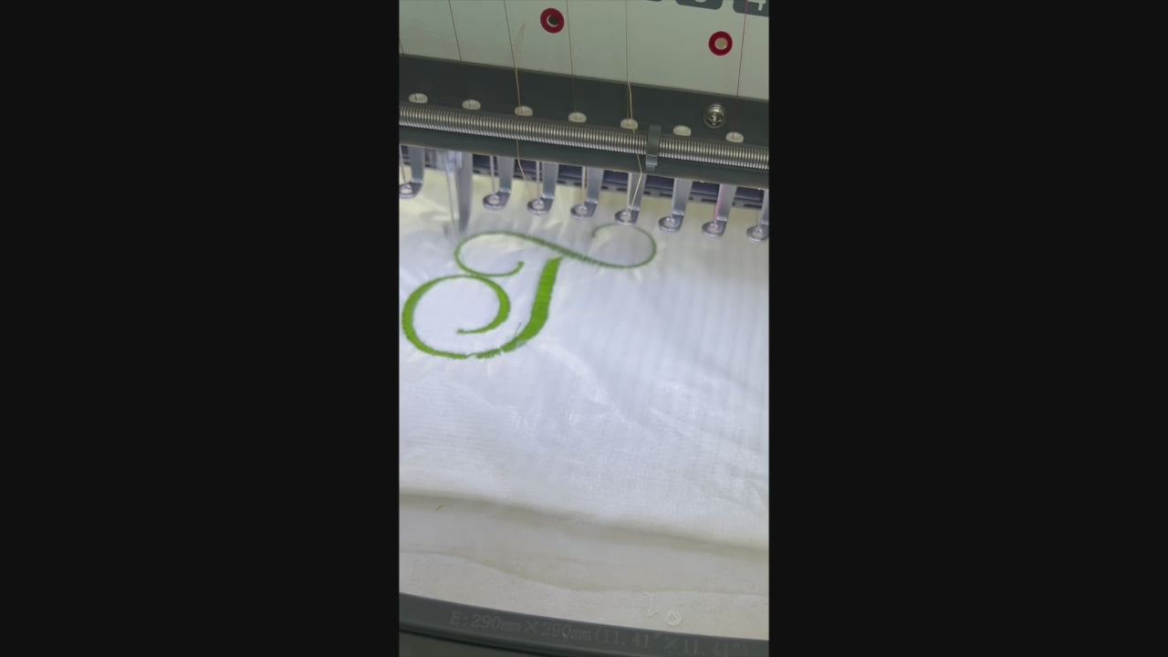 Load video: machine embroidering tea bar towel mats